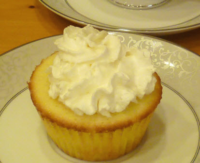Lemon cupcake with whipped cream